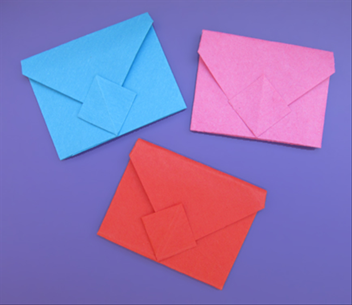 How to fold an origami envelope that closes with a diamond shaped pocket