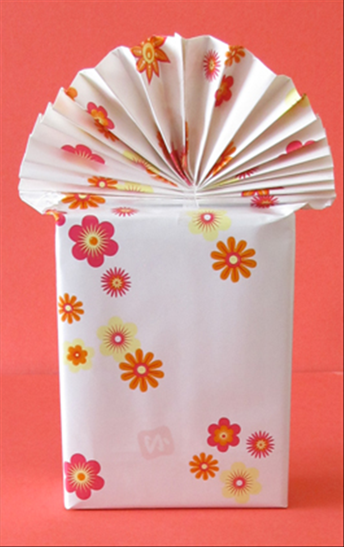 How to Wrap a Gift with a Creative Paper Fan Decoration