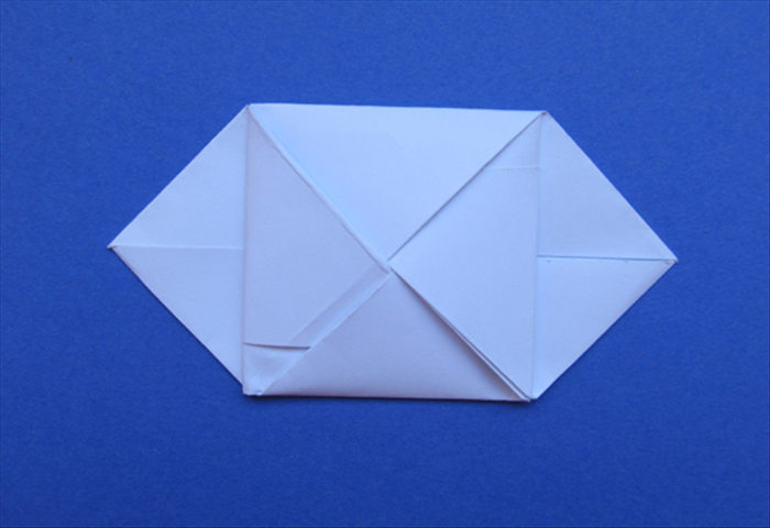 How to fold a letter into an envelope that has an interesting design with flaps at the sides