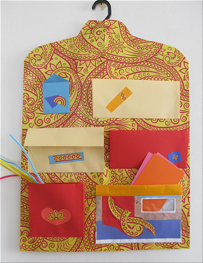 How to make a hanging organizer from a hanger and envelopes