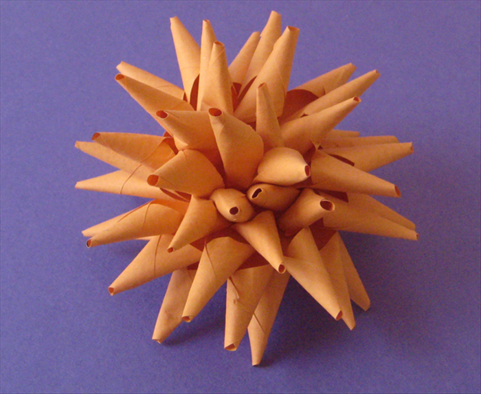 How to make paper dahlia flowers or porcupines. 