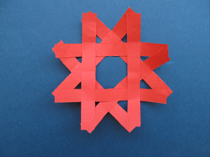 How to make an 8 pointed star from 4 paper strips