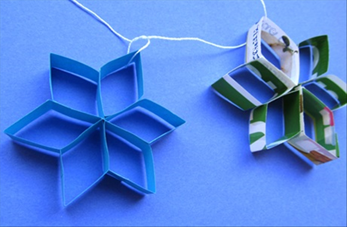 How to make star decorations with paper strips. Children's crafts