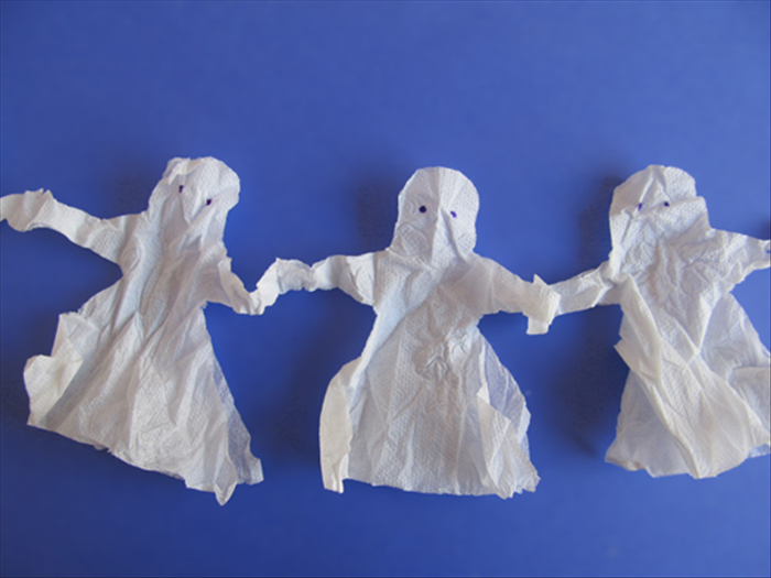 How to make a chain of ghosts from toilet paper