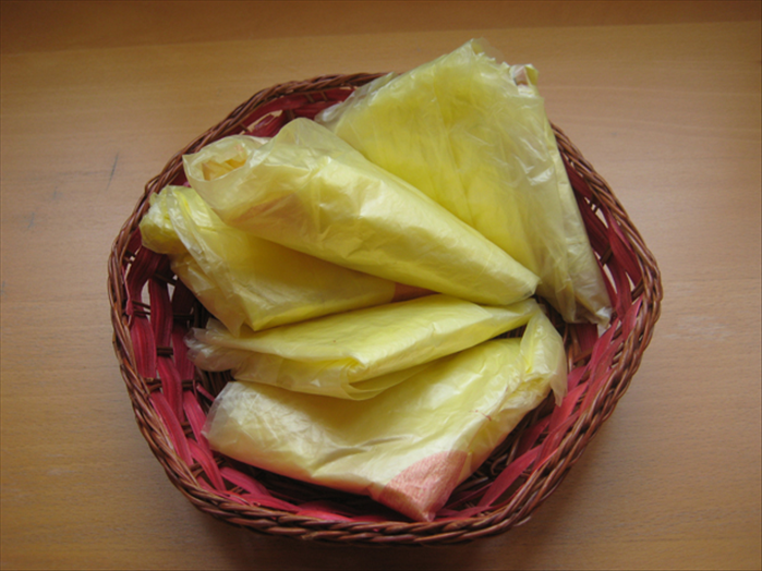 How to Neatly Store Plastic Bags: Fold Them into Triangles & Save Space